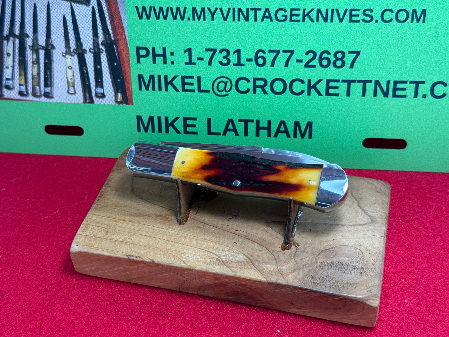 STEIGERWALT, KEN CUSTOM 2010 SEASHELL STAMP SLIP JOINT MANUAL ACTION CUSTOM KNIFE WORMED GROVED AMBER BONE HANDLES