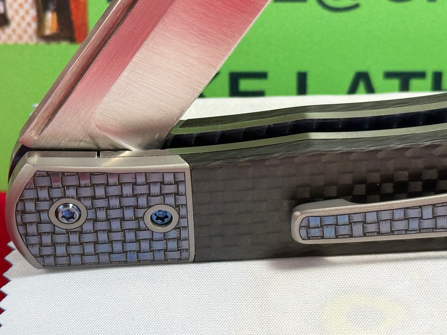 CHEW, LARRY CUSTOM 2023 D/A TRAPPER SHIELD RELEASE CUSTOM ARTWORK BY WILFRED "CHIP" VALTAKIS CUSTOM AUTOMATIC KNIFE CARBON FIBER HANDLES
