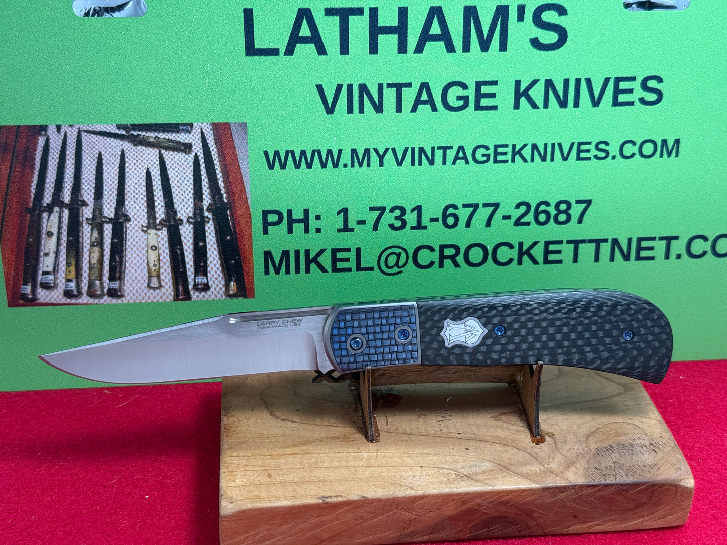 CHEW, LARRY CUSTOM 2023 D/A TRAPPER SHIELD RELEASE CUSTOM ARTWORK BY WILFRED "CHIP" VALTAKIS CUSTOM AUTOMATIC KNIFE CARBON FIBER HANDLES