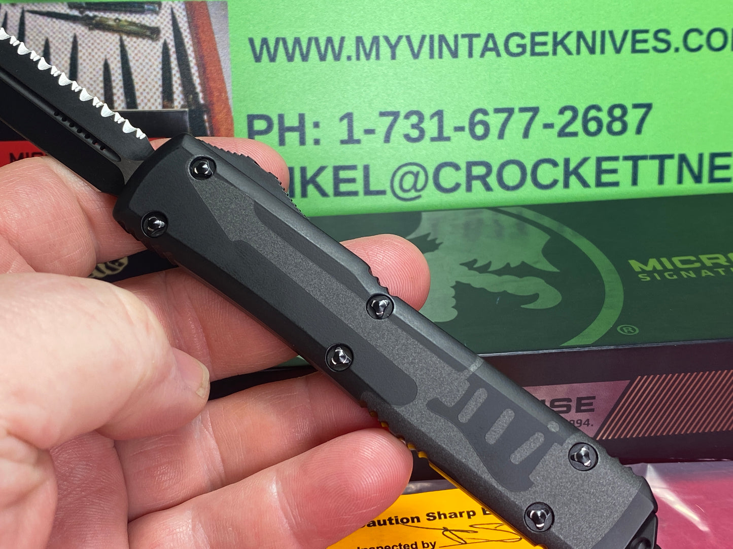 MICROTECH ULTRATECH D/E OTF 05/2021 NCKS 122-3 NCKSTS EXCLUSIVE SIGNATURE SERIES TACTICAL FULL SERRATTED RINGED HARDWARE S/N 007 BLACK TACTICAL HANDLES ETCHED BLACK GUITAR