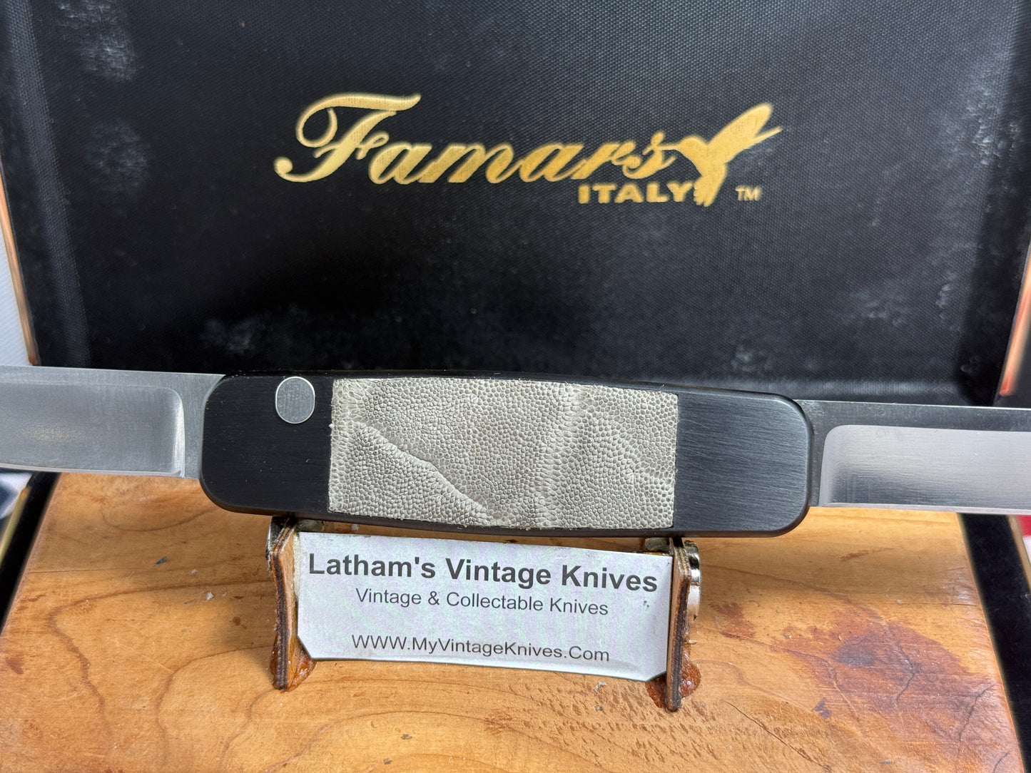 FAMARS ITALY 2012 TWIN BLADE DOUBLE BUTTON PICCOLO AAO759 ITALIAN AUTOMATIC KNIFE BLACK ALUMINUM WITH ELEPHANT IN LAY HANDLES