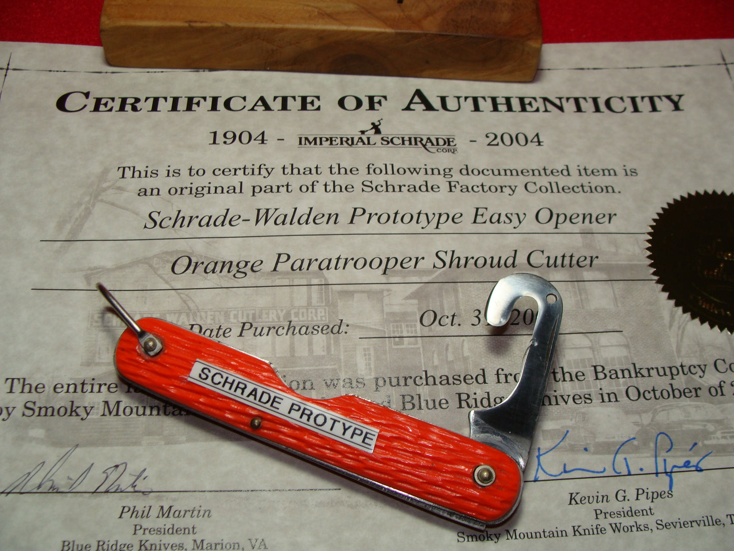 SCHRADE WALDEN NY 1946-76 PROTOTYPE EASY OPENER FOLDING PARATROOPER SHROUD CUTTER MILITARY NON AUTOMATIC KNIFE ORANGE DELRIN HANDLES PART OF THE SCHRADE FACTORY COLLECTION