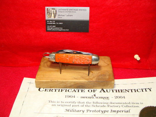 IMPERIAL STAINLESS USA 1960-76 MILITARY PROTOTYPE 4 BLADE UTILITY FOLDING NON AUTOMATIC KNIFE ORANGE DELRIN HANDLES PART OF THE SCHRADE FACTORY COLLECTION