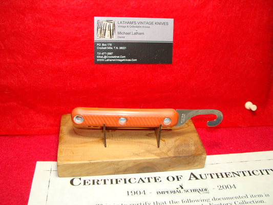 SCHRADE WALDEN 1946-76 FIXED BLADE SHROUD CUTTER NON AUTOMATIC MILITARY ORANGE DELRIN HANDLES PART OF THE SCHRADE FACTORY COLLECTION