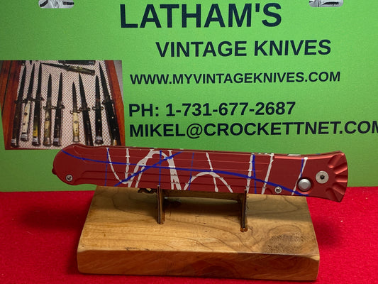 DALTON, ROB USA 1999-2003 LARGE ASSASSIN SIDE OPENING CUSTOM AUTOMATIC TACTICAL AUTOMATIC KNIFE RED AND MIXED COLOR METAL HANDLES