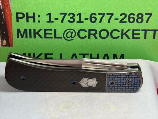 CHEW, LARRY CUSTOM 2023 D/A TRAPPER SHIELD RELEASE CUSTOM ARTWORK BY WILFRED "CHIP" VALTAKIS CUSTOM AUTOMATIC KNIFE CARBON FIBER HANDLES
