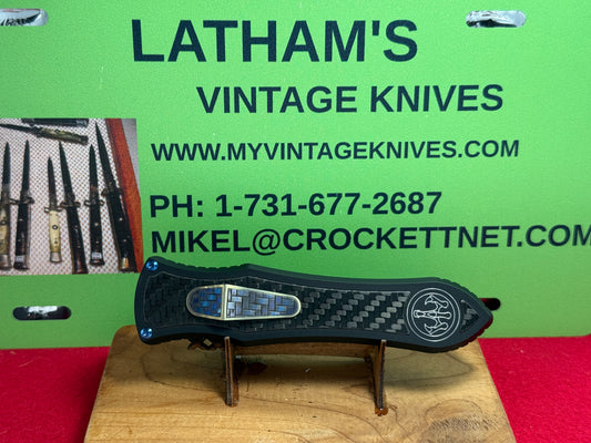 HAWK, G & G 2021 DEAD LOCK OTF MODEL "C" CUSTOM ARTWORK BY WILFRED "CHIP" VALTAKIS CHIPPED METAL CUSTOM AUTOMATIC KNIFE BLACK ALUMINUM HANDLES
