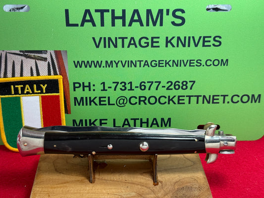 M. ITALY INOX IN CIRCLE 1962-65 TRANSISTION SWIVEL BOLSTER "D" STAMPED STILETTO 33 CM ITALIAN AUTOMATIC KNIFE 5 MM BACKSPRING KRISS BLADE BUFFALO HORN HANDLES