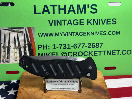 WOODARD, BUCK USA CUSTOM AUTOMATIC 2002-2008 COMBAT AUTO #119 OF 500 TACTICAL AUTOMATIC KNIFE BLACK METAL HANDLES