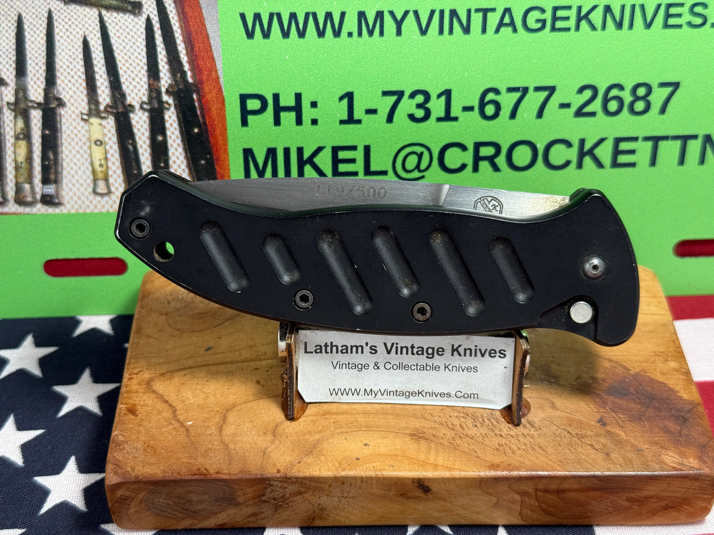 WOODARD, BUCK USA CUSTOM AUTOMATIC 2002-2008 COMBAT AUTO #119 OF 500 TACTICAL AUTOMATIC KNIFE BLACK METAL HANDLES