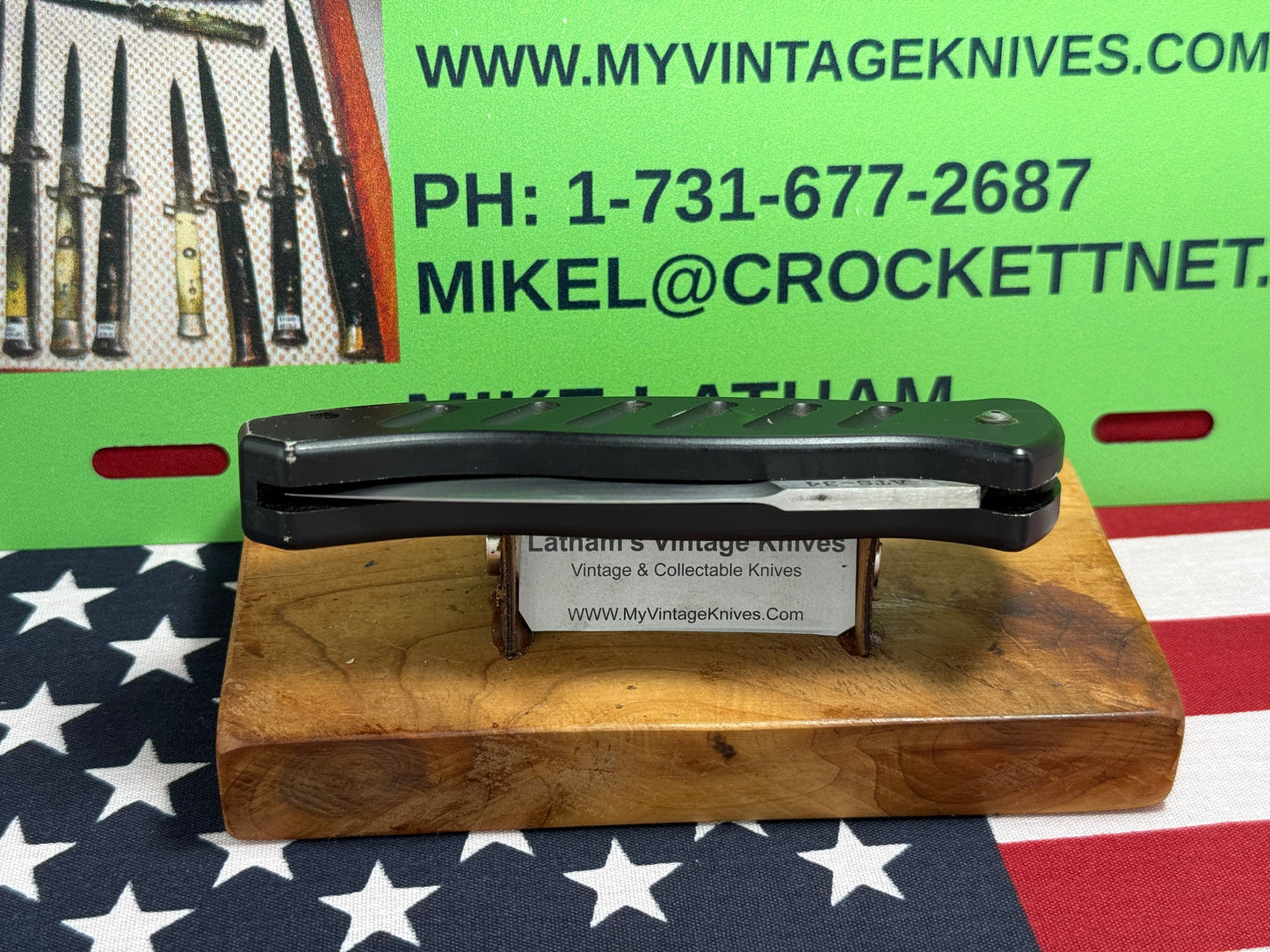 WOODARD, BUCK USA CUSTOM AUTOMATIC 2002-2008 COMBAT AUTO #119 OF 500 TACTICAL AUTOMATIC KNIFE BLACK METAL HANDLES