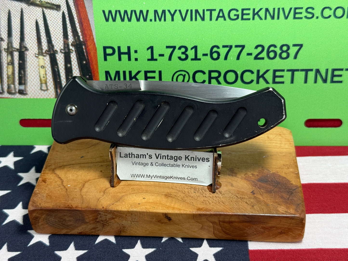 WOODARD, BUCK USA CUSTOM AUTOMATIC 2002-2008 COMBAT AUTO #119 OF 500 TACTICAL AUTOMATIC KNIFE BLACK METAL HANDLES