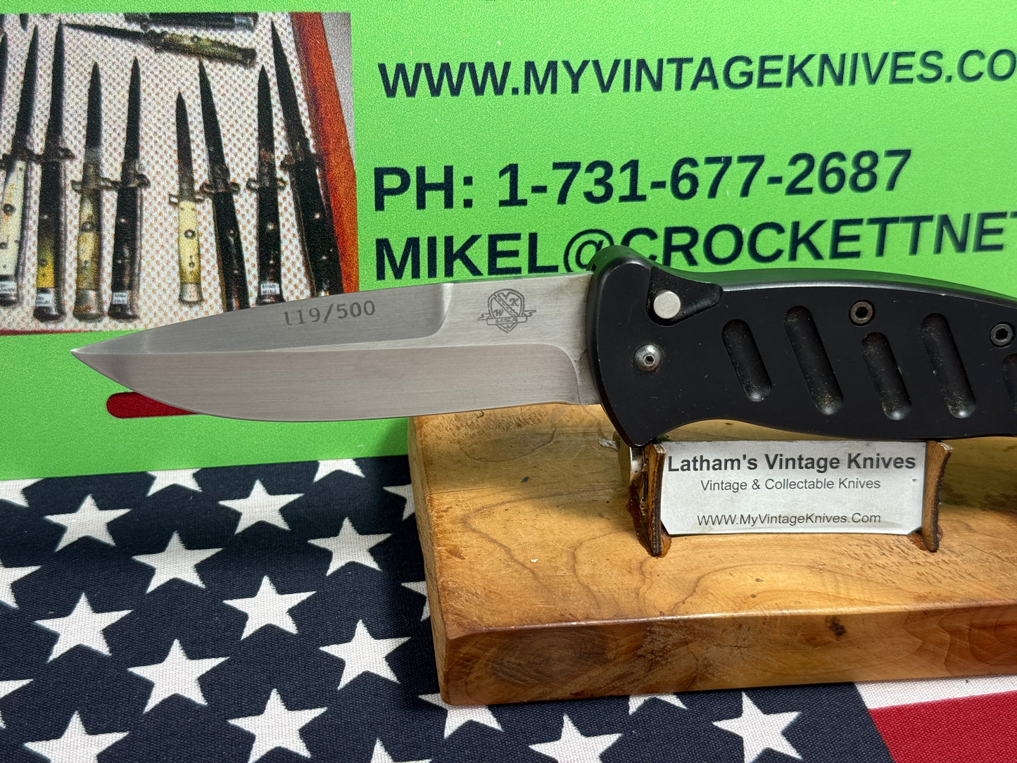 WOODARD, BUCK USA CUSTOM AUTOMATIC 2002-2008 COMBAT AUTO #119 OF 500 TACTICAL AUTOMATIC KNIFE BLACK METAL HANDLES