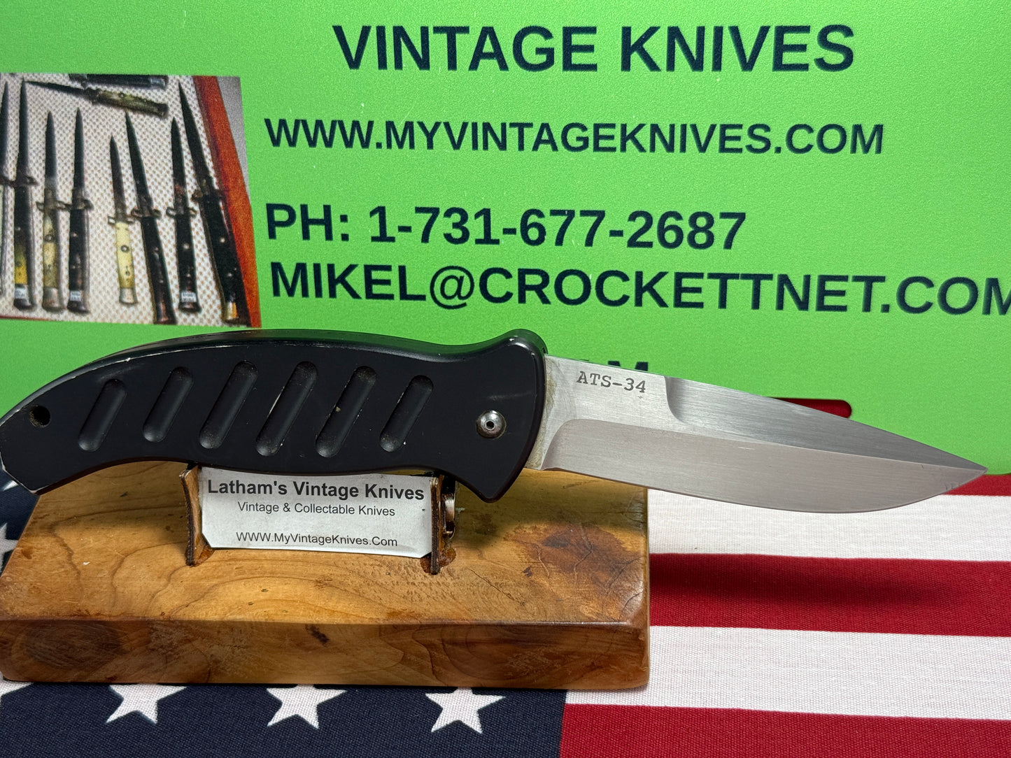 WOODARD, BUCK USA CUSTOM AUTOMATIC 2002-2008 COMBAT AUTO #119 OF 500 TACTICAL AUTOMATIC KNIFE BLACK METAL HANDLES