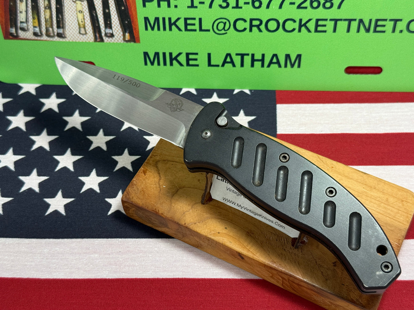 WOODARD, BUCK USA CUSTOM AUTOMATIC 2002-2008 COMBAT AUTO #119 OF 500 TACTICAL AUTOMATIC KNIFE BLACK METAL HANDLES