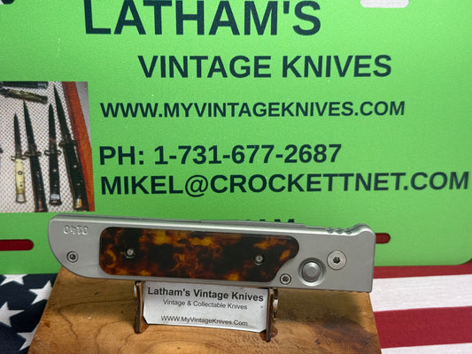 DALTON, ROB CUSTOM AUTOMATIC KNIFE 1998-2010 SIDE OPENING TANK WITH TORTOISE SHELL INSERTS TACTICAL AUTOMATIC KNIFE GRAY METAL HANDLES