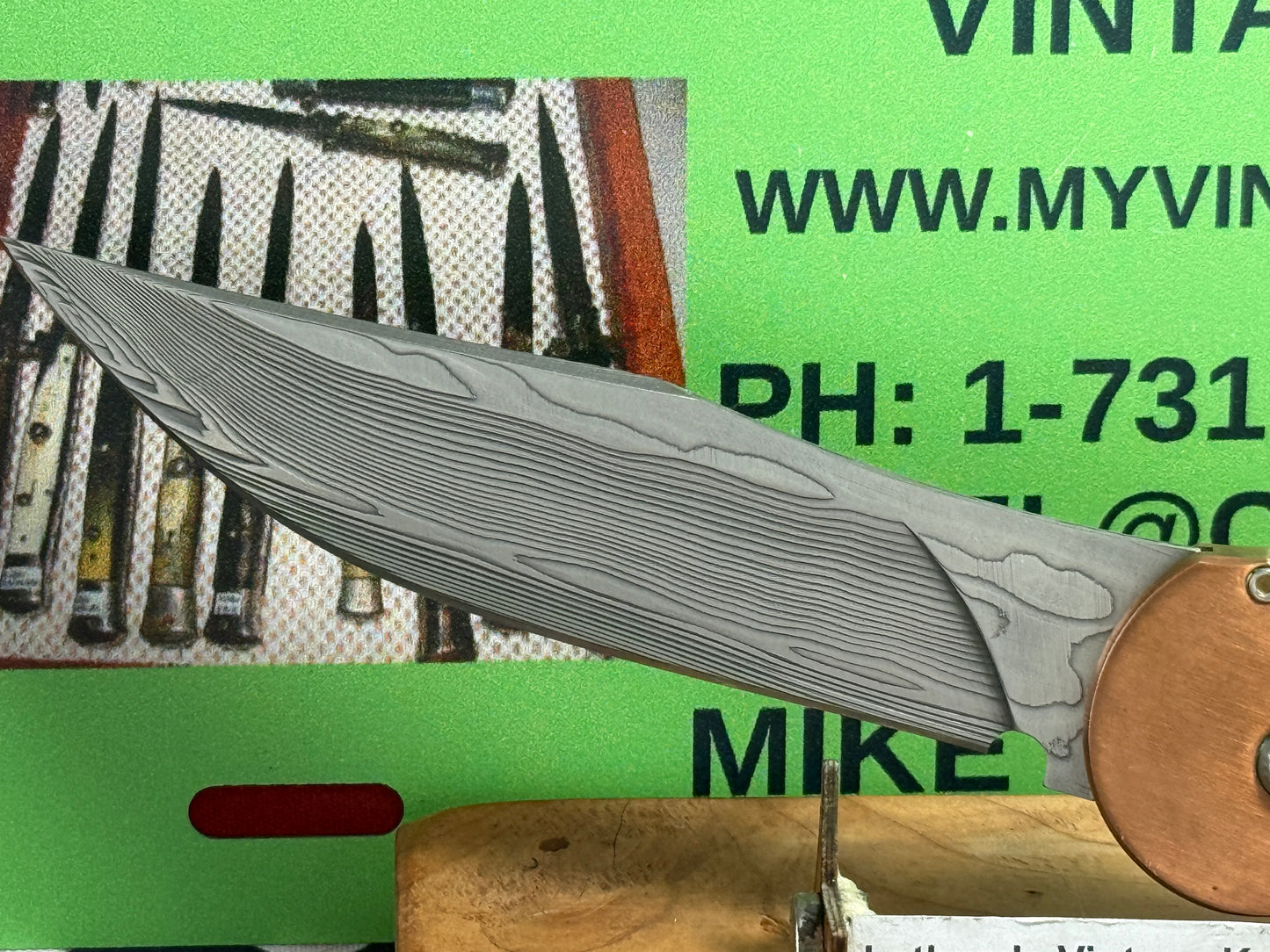 DALTON, ROB CUSTOM AUTOMATIC KNIFE 1998-2010 SIDE OPENING COPPER COMCAT DAMACUS STEEL TACTICAL AUTOMATIC KNIFE COPPER WITH BLACK FIBER HANDLES
