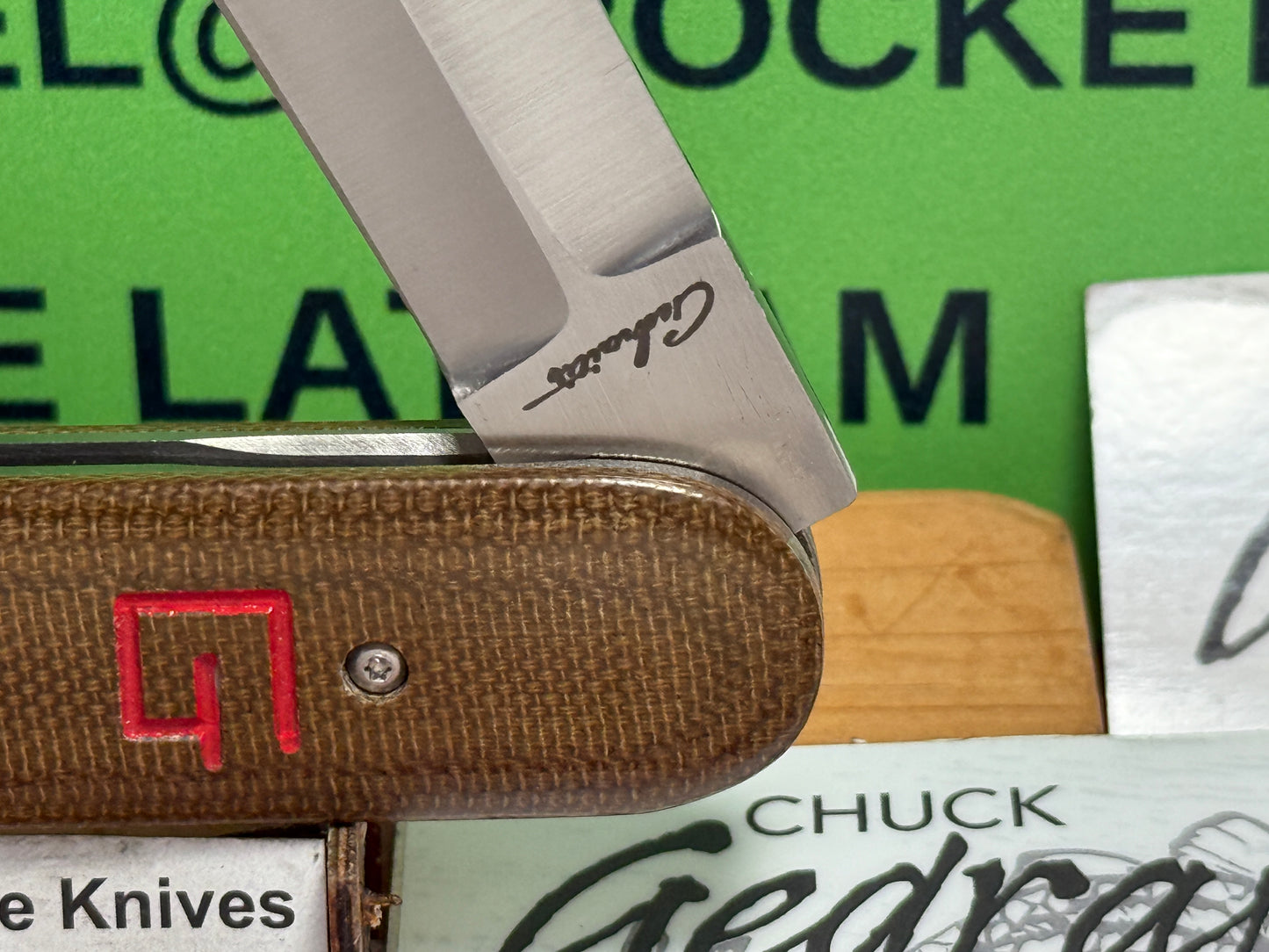 GEDRAITIS, CHUCK CUSTOM KNIVES 2025 SCALE RELEASE SWITCH ARMY LOVELESS INSPIRED BLADE GRIND CPM 154 CUSTOM AUTOMATIC KNIFE ODGREEN CANVAS MICARTA HANDLES