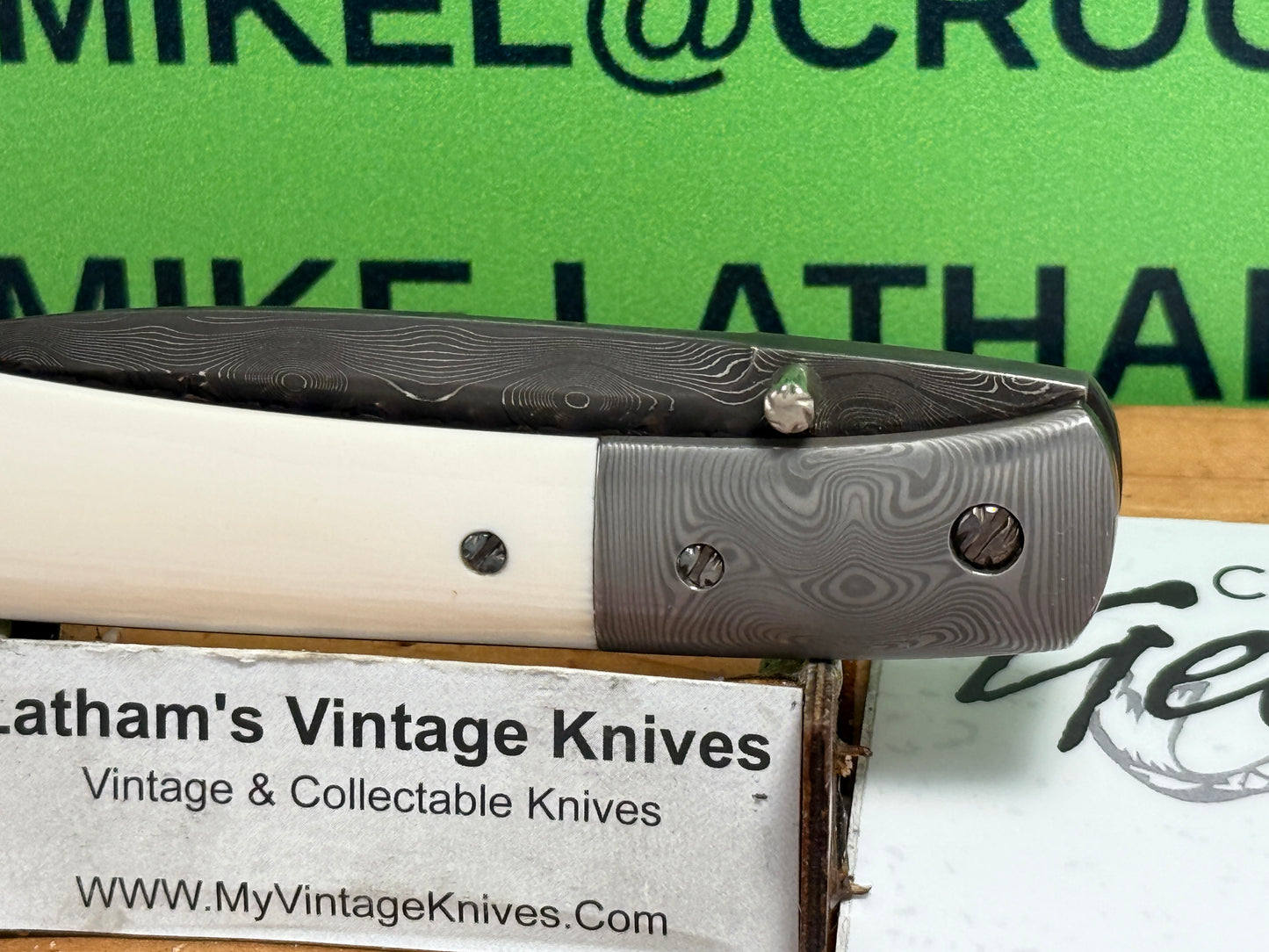 GEDRAITIS, CHUCK "C.J.G." CUSTOM KNIVES 1999-2005 ERA FOLDING LINERLOCK DAMACUS STEEL CUSTOM MANUAL KNIFE MAMMOTH IVORY HANDLES