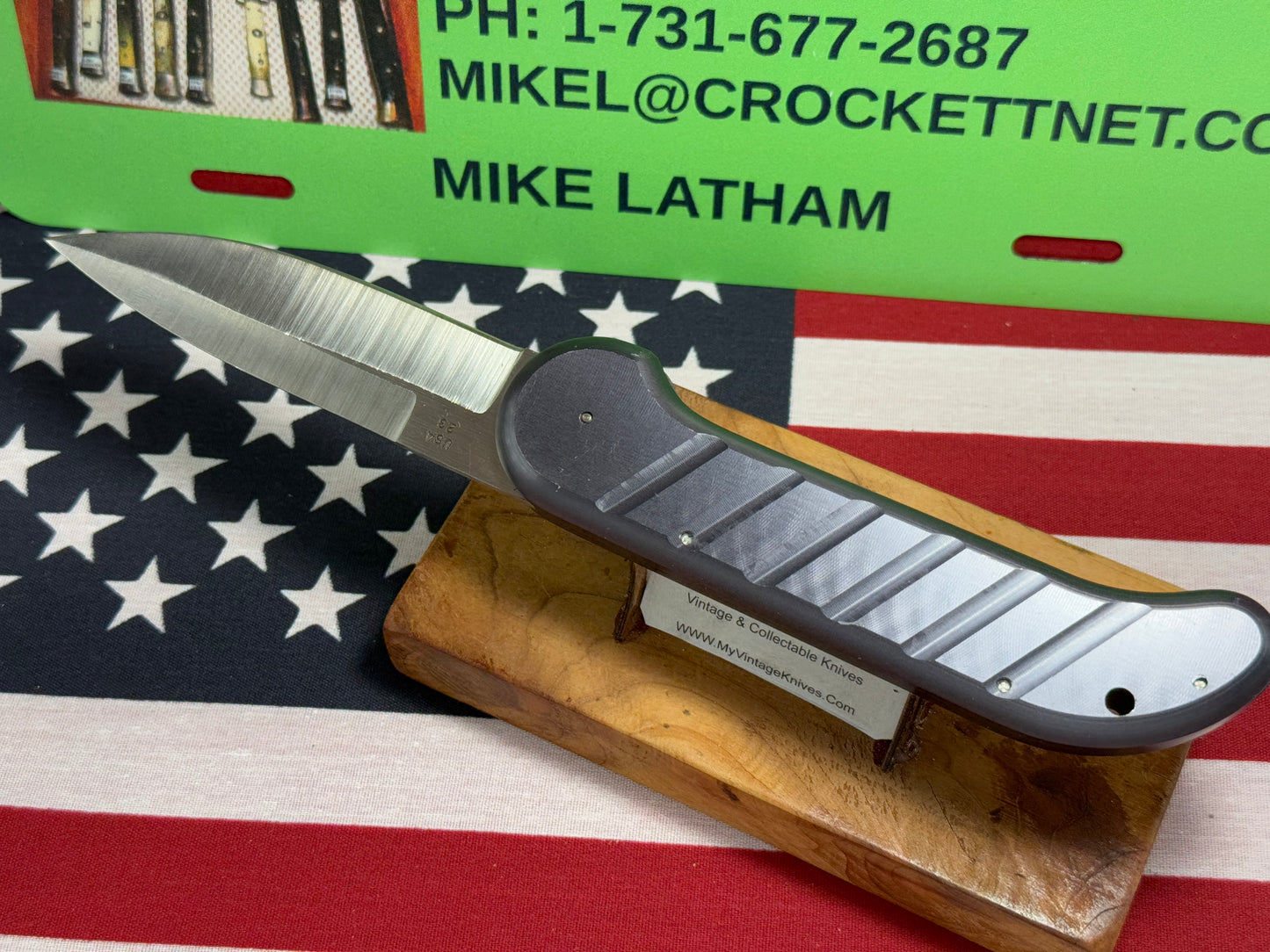 DALTON, ROB USA 1998-2003 LARGE SEAL TEAM 1 USA 23 MILITARY CUSTOM AUTOMATIC KNIFE BLACK METAL HANDLES