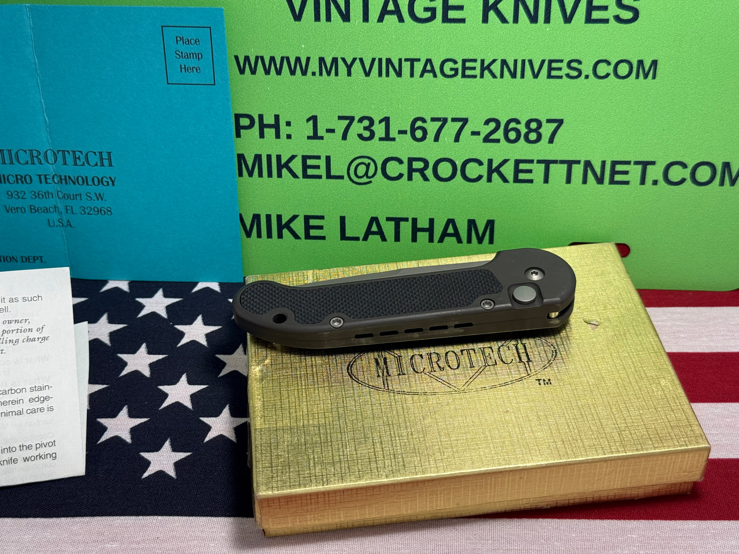 MICROTECH USA 10/1996 L-UNDERWATER DEMOLITION TEAM (UDT) TACTICAL AUTOMATIC KNIFE BLACK METAL HANDLES