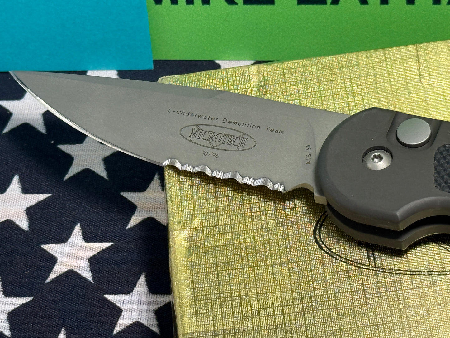 MICROTECH USA 10/1996 L-UNDERWATER DEMOLITION TEAM (UDT) TACTICAL AUTOMATIC KNIFE BLACK METAL HANDLES