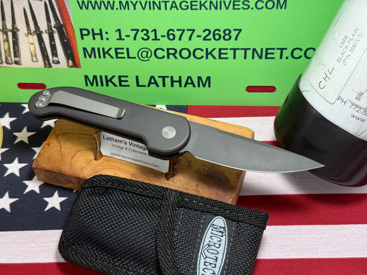 MICROTECH USA 12/2003 UMS 1960 BLACK PLAIN TACTICAL AUTOMATIC KNIFE BLACK METAL HANDLES