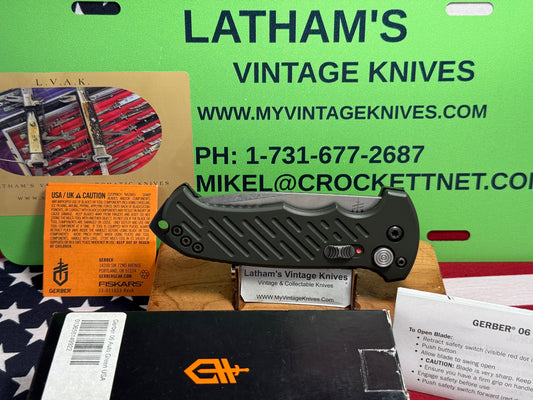 GERBER USA 2016 AUTO 06 TACTICAL 10 YR ANNIVERSARY TACTICAL AUTOMATIC KNIFE OD GREEN ALUMINUM HANDLES.