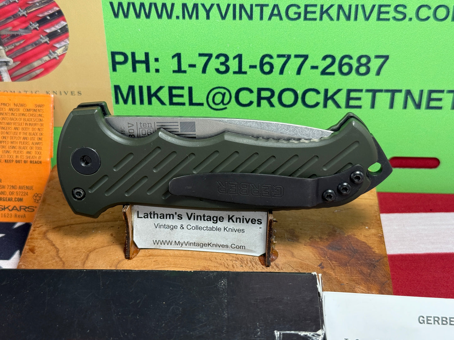 GERBER USA 2016 AUTO 06 TACTICAL 10 YR ANNIVERSARY TACTICAL AUTOMATIC KNIFE OD GREEN ALUMINUM HANDLES.