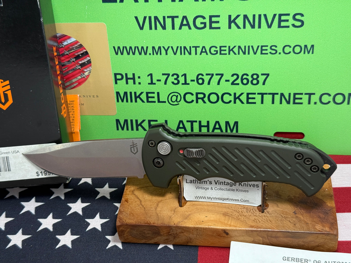 GERBER USA 2016 AUTO 06 TACTICAL 10 YR ANNIVERSARY TACTICAL AUTOMATIC KNIFE OD GREEN ALUMINUM HANDLES.