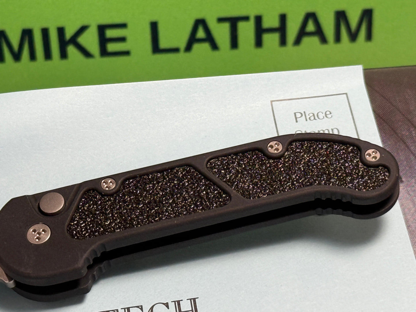 MICROTECH USA 03/2005 TACTICAL MINI U.M.S. STONEWASH PLAIN S/N 1256 TACTICAL AUTOMATIC KNIFE BLACK METAL HANDLES