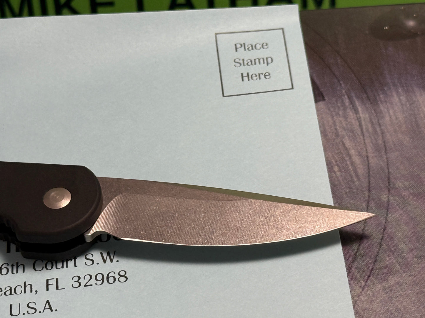 MICROTECH USA 03/2005 TACTICAL MINI U.M.S. STONEWASH PLAIN S/N 1256 TACTICAL AUTOMATIC KNIFE BLACK METAL HANDLES