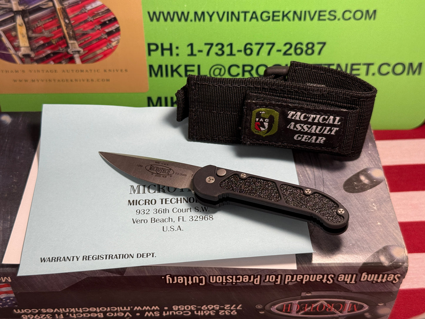 MICROTECH USA 03/2005 TACTICAL MINI U.M.S. STONEWASH PLAIN S/N 1256 TACTICAL AUTOMATIC KNIFE BLACK METAL HANDLES