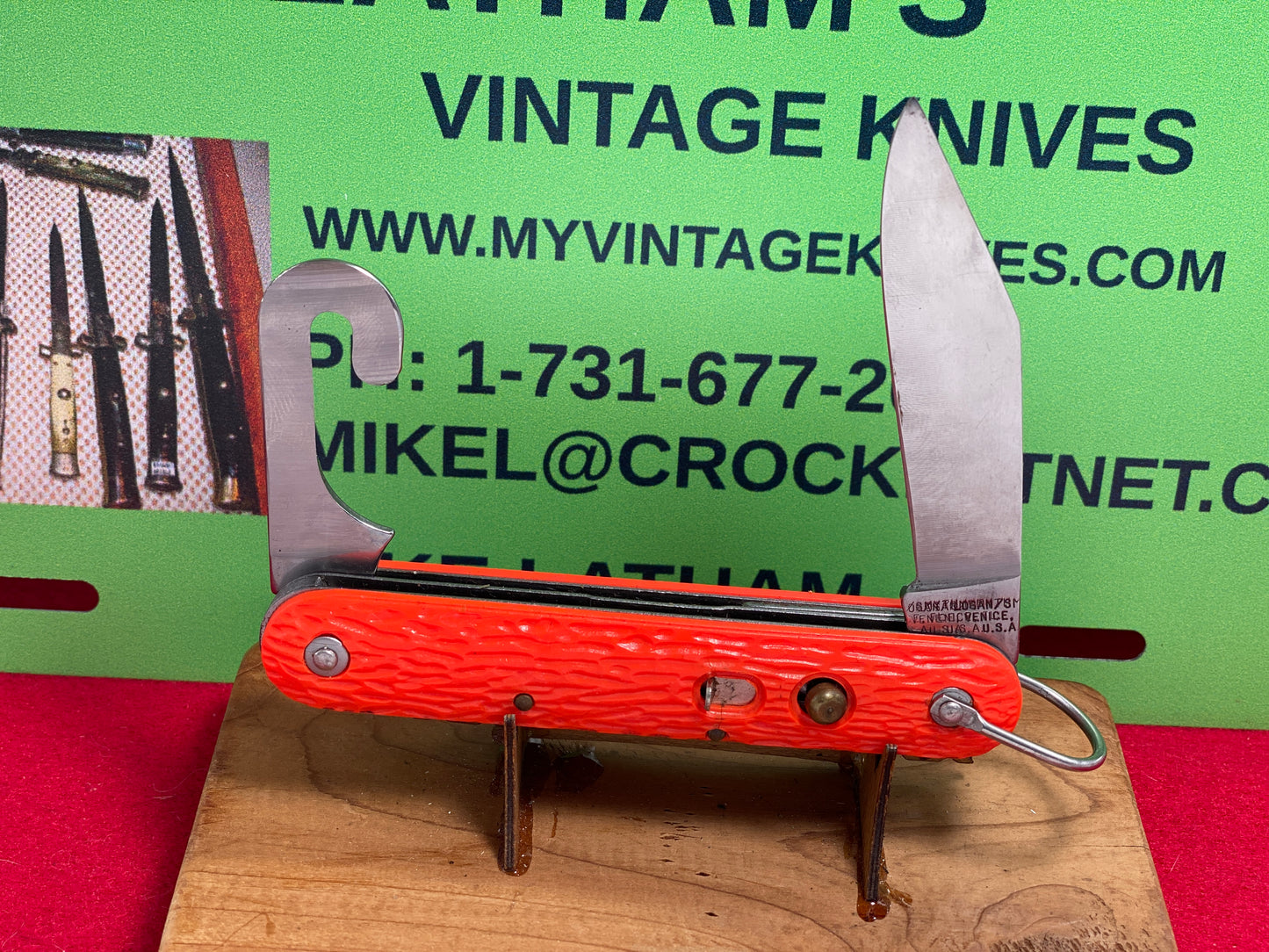 LOGAN/SMYTH VENICE FL USA 1990 DOUBLE STAMPED PARATROOPER MILITARY AMERICAN AUTOMATIC KNIFE ORANGE DELRIN HANDLES