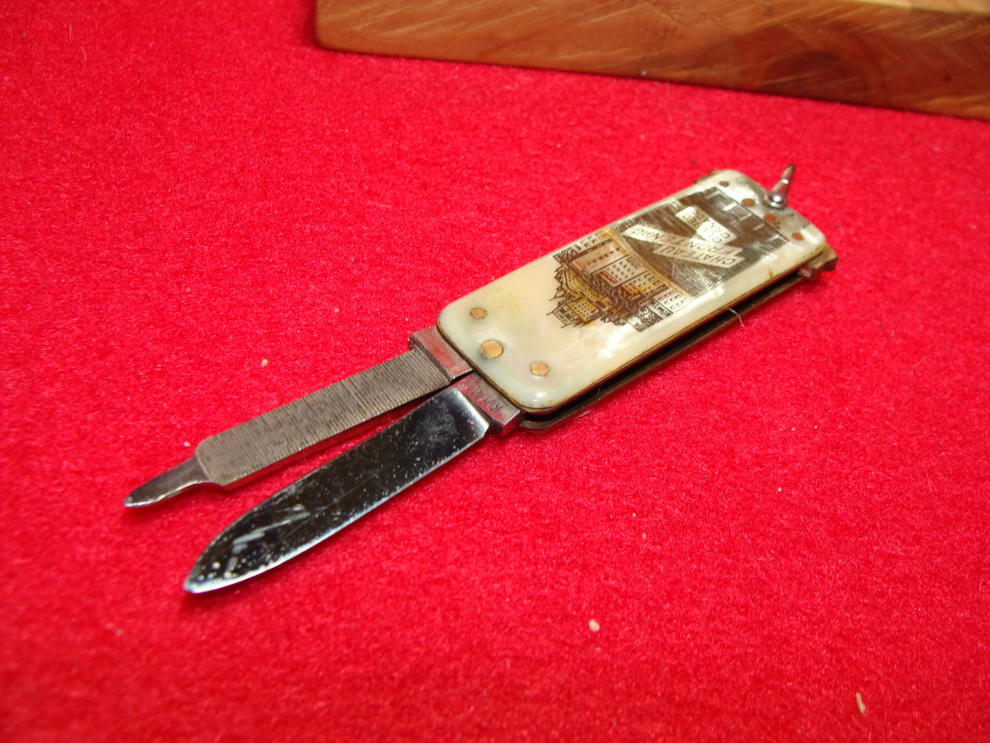 ROYAL 1950-55 GERMANY CHATEAU FRONTENAC CANADA ADV. DOUBLE BLADE NOVELTY TAB RELEASE GERMAN AUTOMATIC KNIFE CRACKED ICE CELLULOID HANDLES